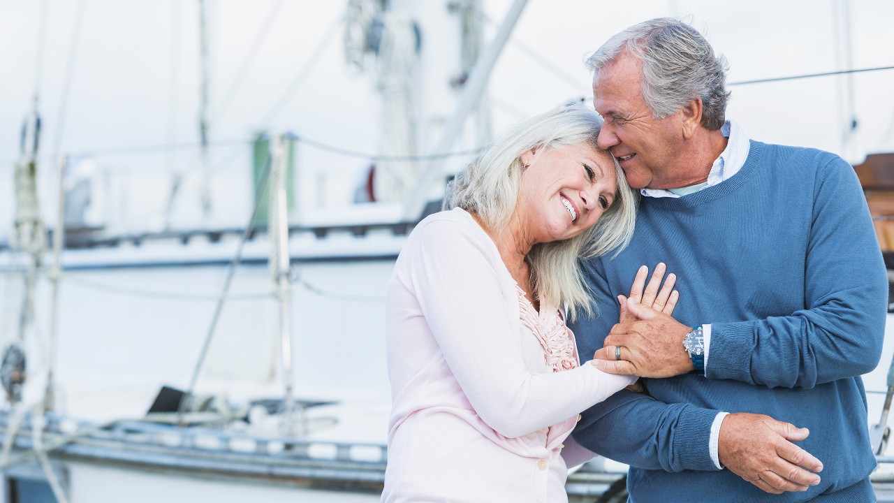 mature couple on yacht