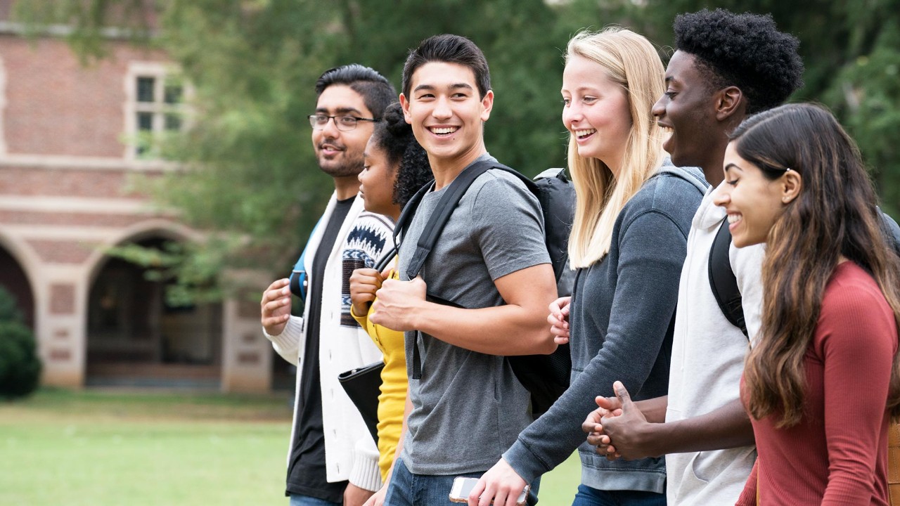 group of college students walking on campus; image used for HSBC International Services Study abroad page. 