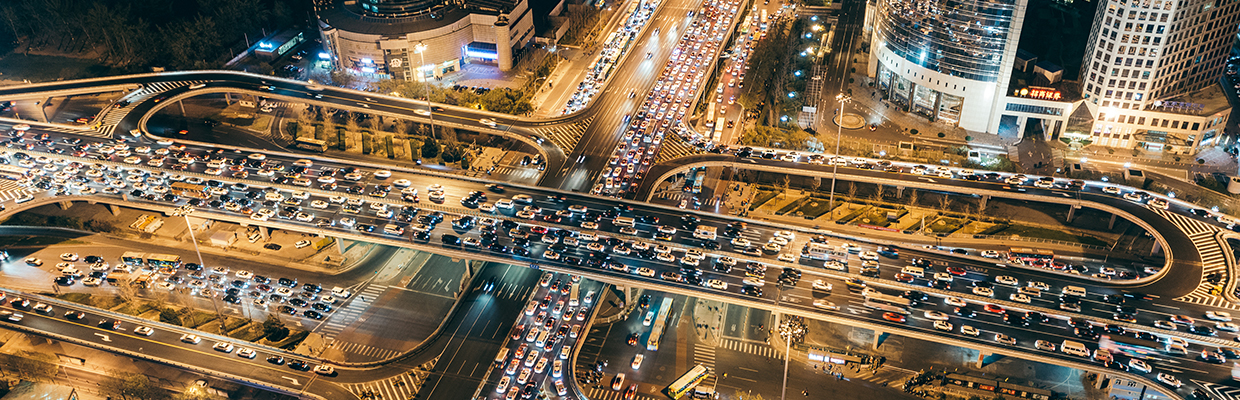 busy multi-lane highway at night; image used for HSBC International Services for Chinese Executives